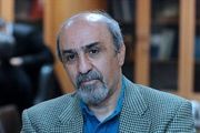 گودرزی با چهره ای خندان هتل المپیک را ترک کرد/ عکس 